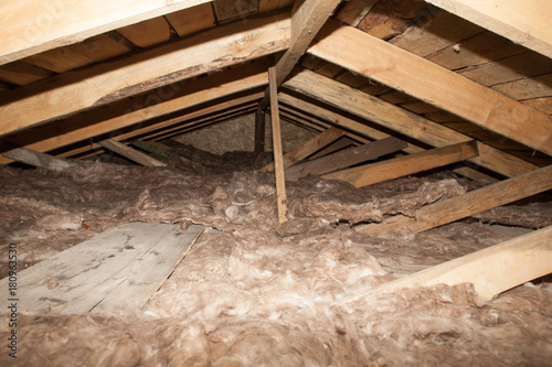 mineral wool in the attic of the house Foam plastic Insulation of a new home on a new roof