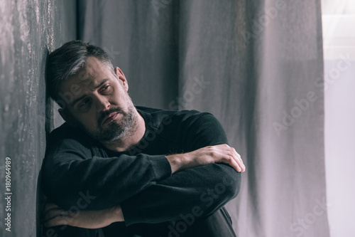 Sad man during autumn weather