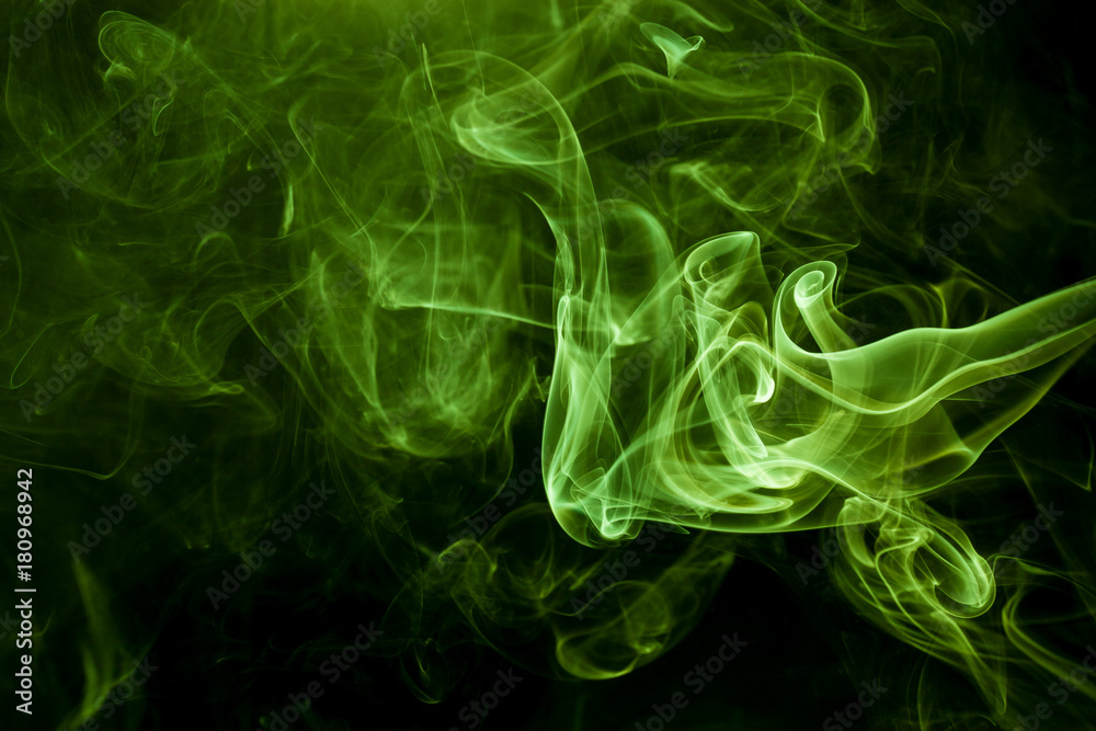 Green smoke on a black background. smoke on a black background.