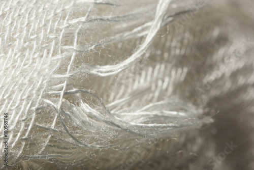 Surface of threads of white viscose macro photo