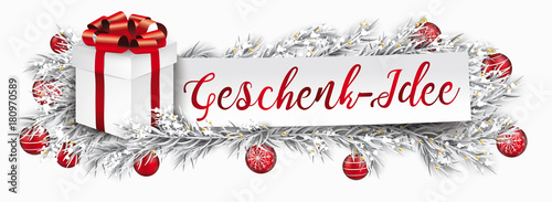 Header mit einem Geschenkkarton mit Tannenzweigen und Weihnachtskugeln und Papierzettel mit dem Wort Geschenk-Idee