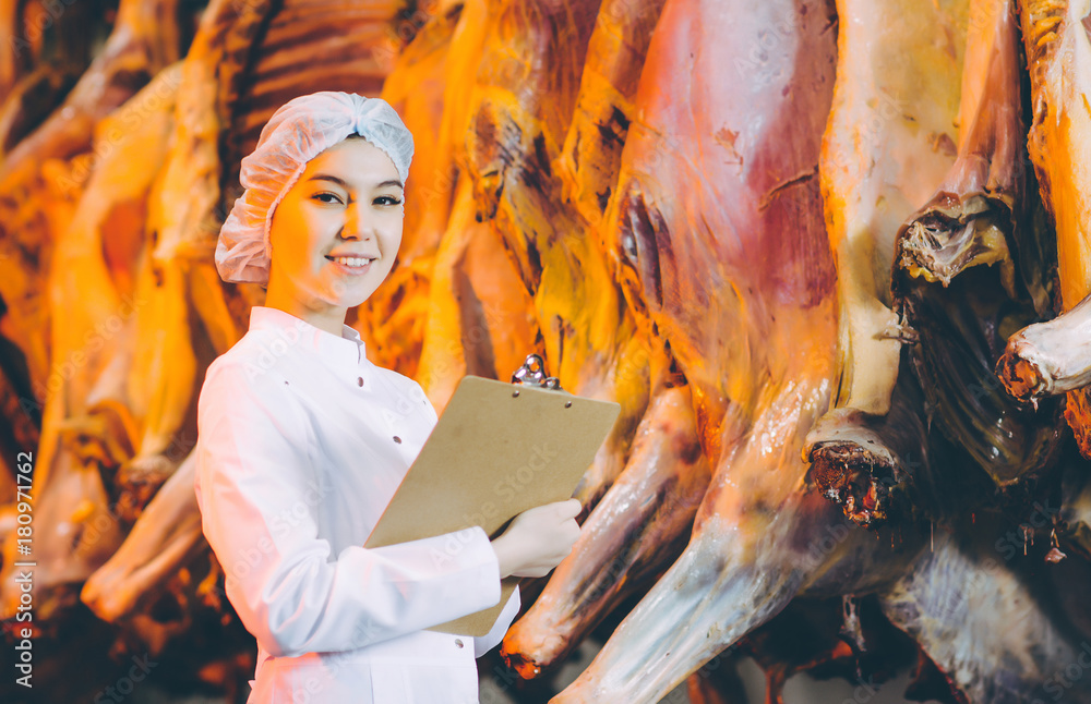 Fototapeta premium Raw meat production factory worker