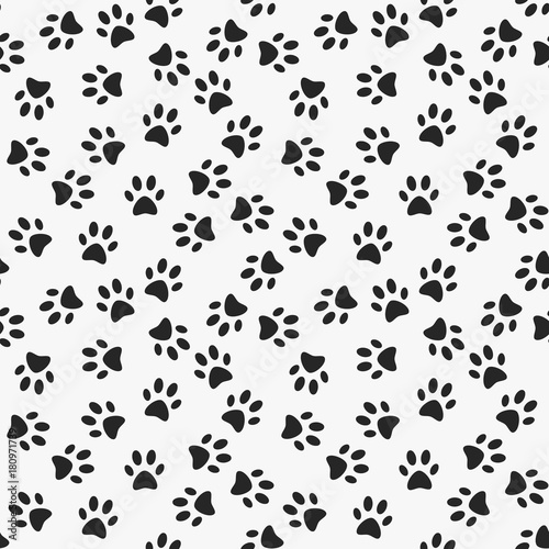 Dog paw print vector seamless pattern