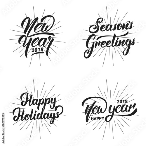 New Year. Happy New Year 2018 hand lettering labels set with gold shiny texture. Hand drawn logo for New Year card, poster, design etc © Stock Vector One