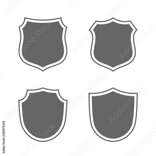 Shield shape icons set. Gray label signs isolated on white. Symbol of protection, arms, coat honor, security, safety. Flat retro style design. Element vintage heraldic emblem Vector illustration