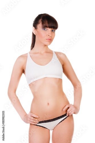 beautiful young woman with slim body in underwear isolated