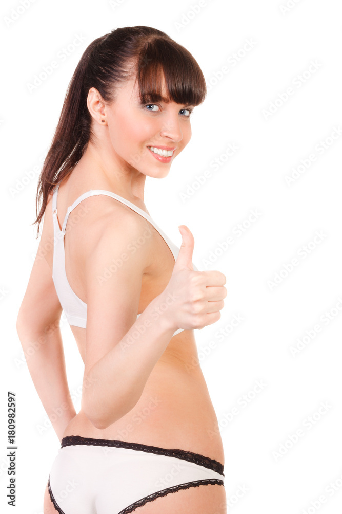 beautiful young woman with slim body in underwear shows thumb up isolated beautiful young woman with slim body in underwear shows thumb up isolated