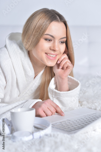 young woman using  laptop