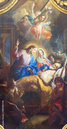 VIENNA, AUSTRIA - JULY 30, 2014: The painting of Death of St. Joseph on the side altar in church Pfarkirche Maria Hietzing by Johann Michael Rottmayr (1712).