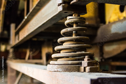 Old industrial spring at factory photo