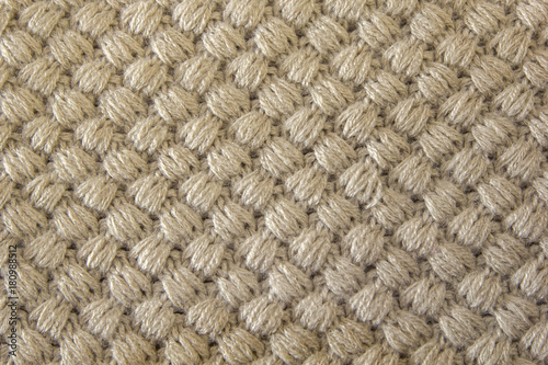 Gray knitted fabric made of heathered yarn textured background