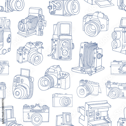 Monochrome seamless pattern with old and digital photo cameras hand drawn with blue contour lines on white background. Vector illustration in doodle style for wallpaper, wrapping paper, backdrop.