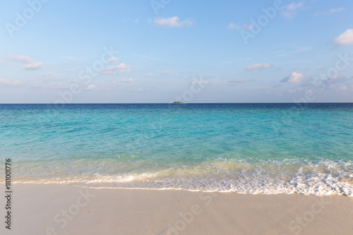 distant tropical island on a sunny day