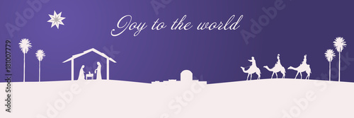 Christmas time. The three kings follow the star to Bethlehem in purple landscape. Text: Joy to the world