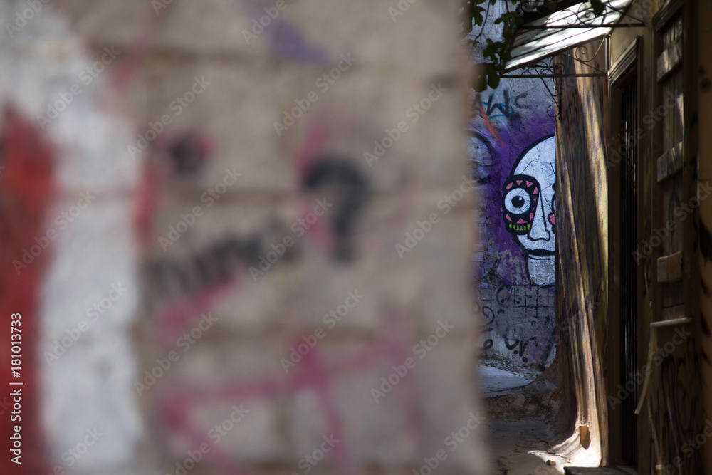 Graffiti in small street in Plaka, Athens