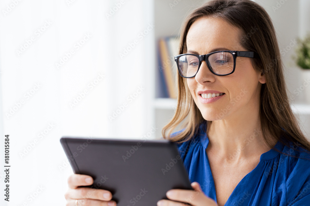woman with tablet pc working at home or office woman with tablet pc working at home or office