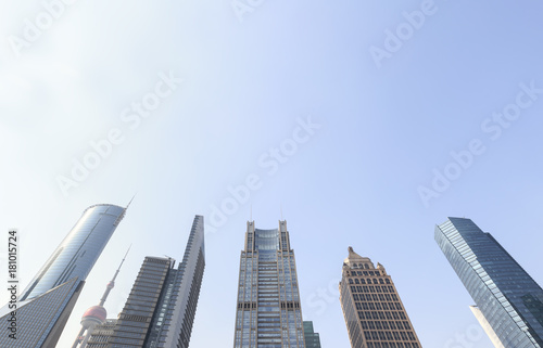 Office buildings in modern city with blue sky