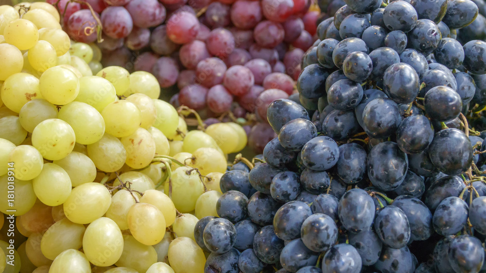 Fresh white, pink and black grapes