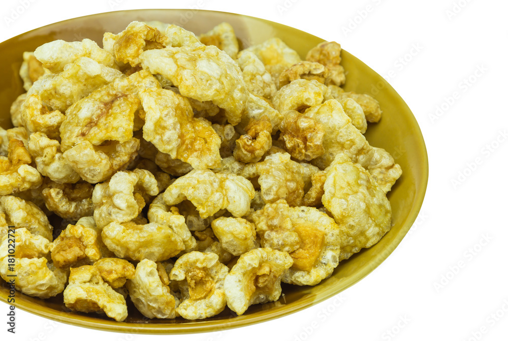pork cracklings on isolated white background pork cracklings on isolated white background
