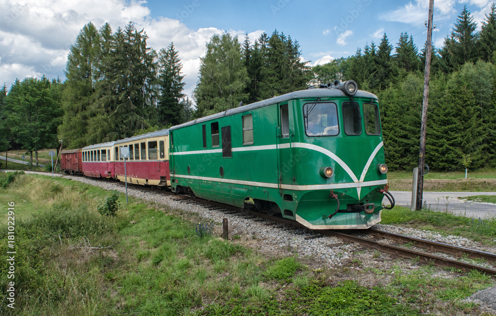 Old train with locomotive in the countryside Old train with locomotive in the countryside