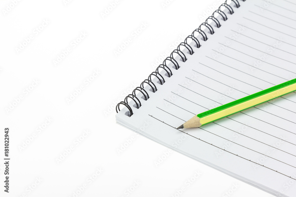 Pencil put on Paper note book.