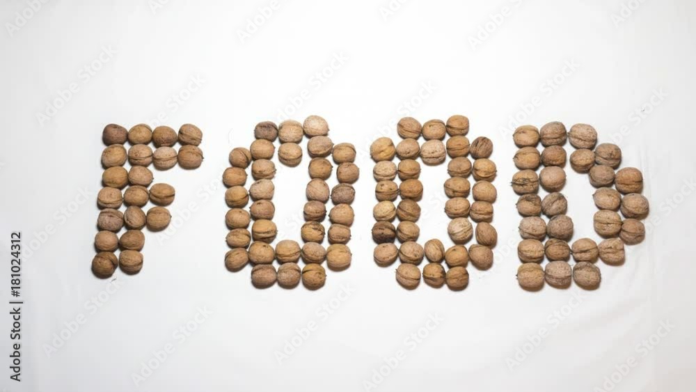 Food word written with letters formed from walnut Food word written with letters formed from walnut