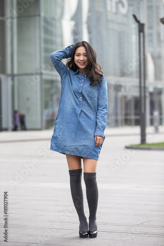 One beautiful young asian woman in the street