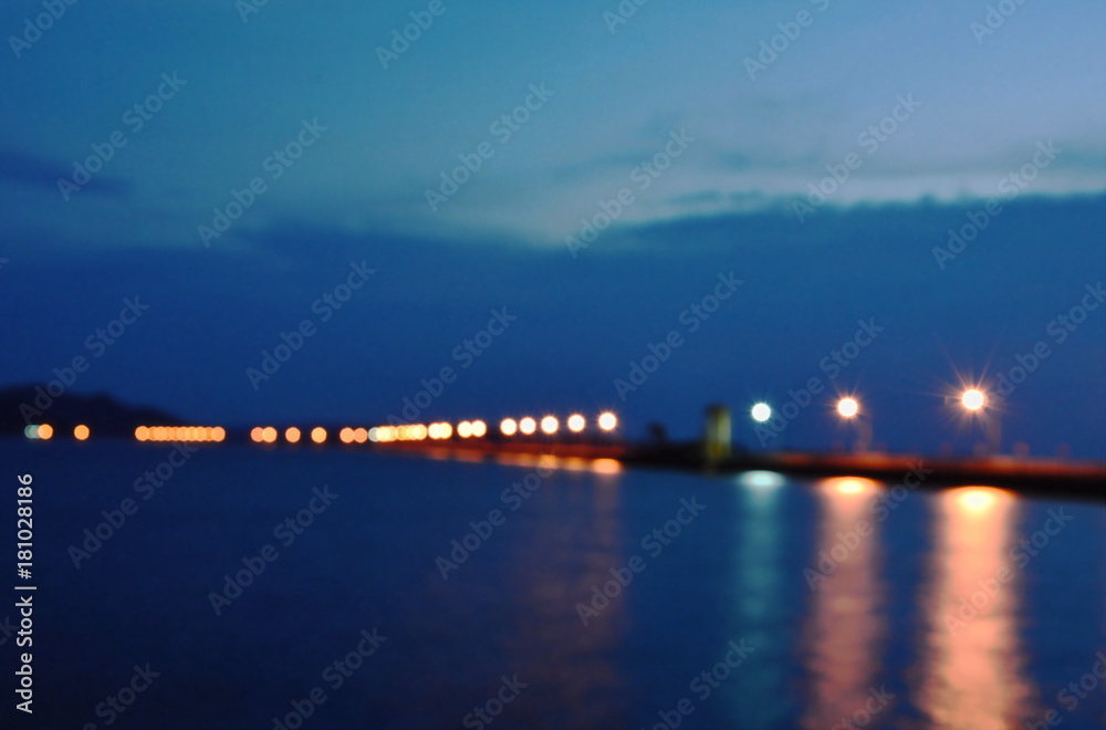 blurry of Khun Dan Prablurry of karn Chon big concrete dam in Thailand on twilight sky