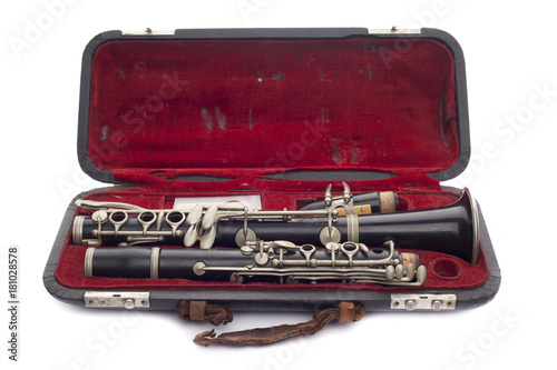 Antique Clarinet broken down in its travel case Isolated on white © filipobr