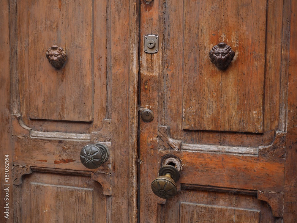 Old door with broken handle. Old door with broken handle.