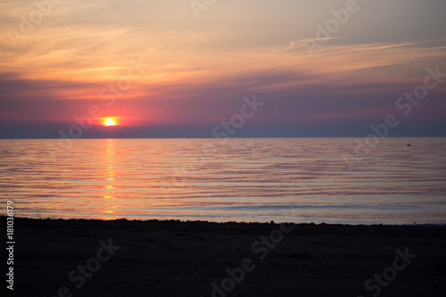 Sea Sunrise with clouds and waves