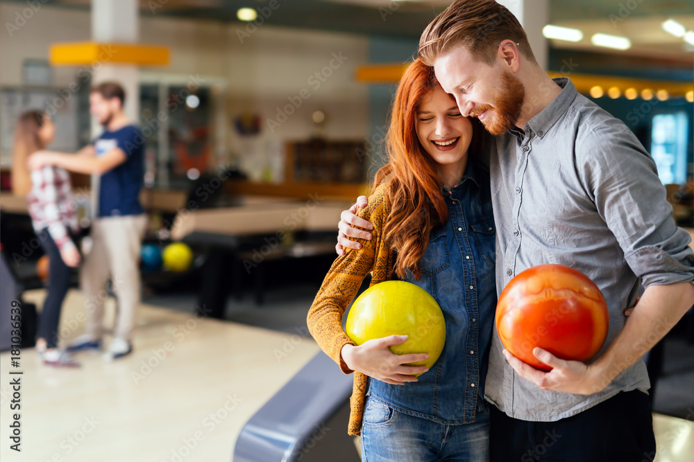 Fototapeta premium Beautiful couple dating and bowling