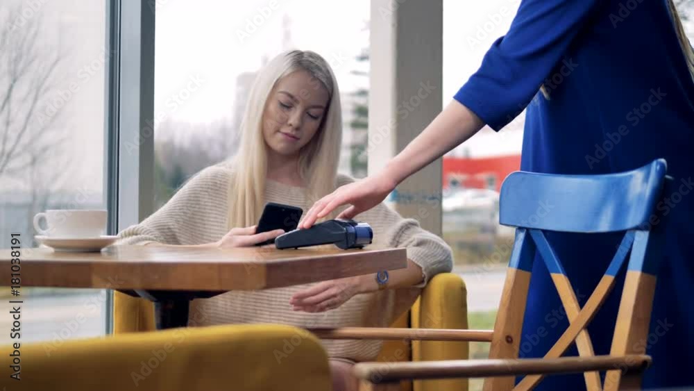 Person using mobile payment PayPass. Person using mobile payment PayPass.