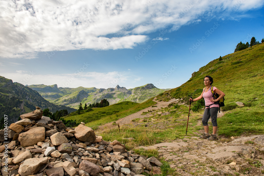 mature woman hiking in the Pyrenees mountains