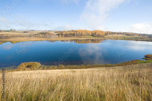 Gorodischenskoe lake in the golden autumn. Izborsk, Russia