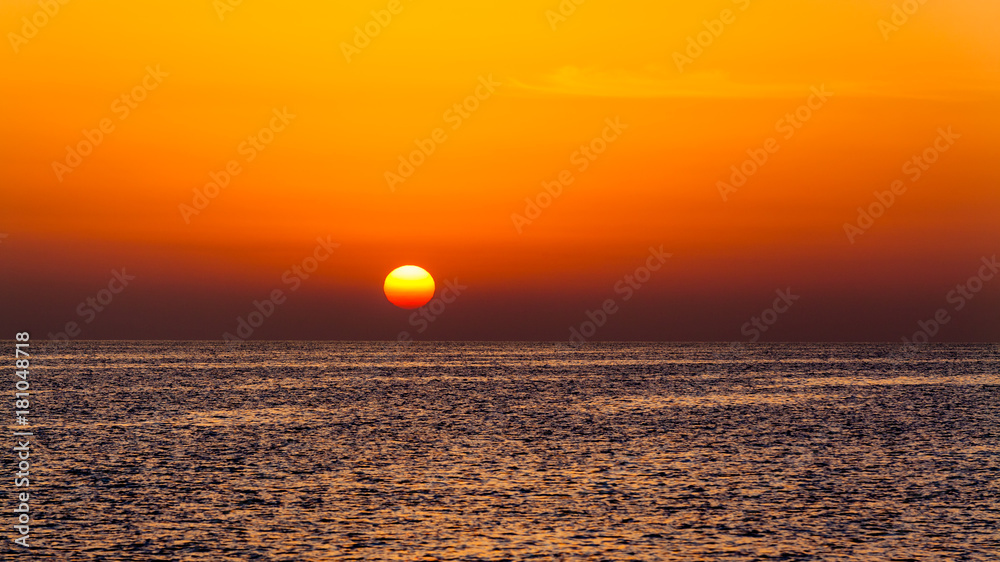 Beautiful sunset above the sea. sunset sky background