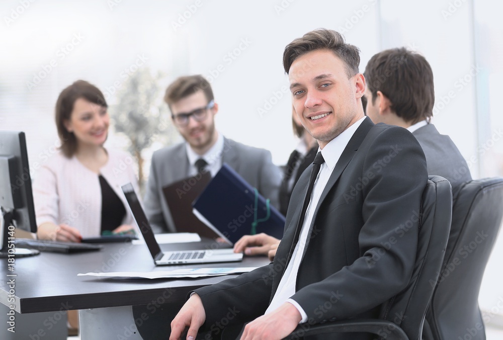 business team with a senior Manager in the foreground business team with a senior Manager in the foreground