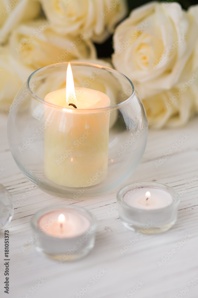 Big palm candle in glass ball with white roses Big palm candle in glass ball with white roses
