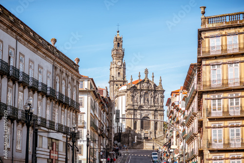 Street view with Clerics church during the sunny day in Porto city, Portugal photo