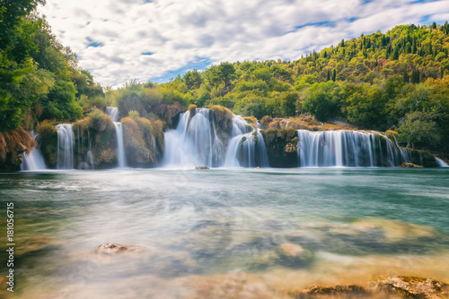 Waterfall in Krka National Park, famous Skradinski buk, one of the most beautiful waterfalls in Europe and the biggest in Croatia, amazing nature landscape © larauhryn