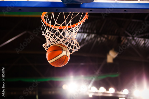 scoring during a basketball game - ball in hoop © Melinda Nagy