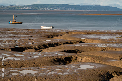 Two boats await their next adventure in Morecambe Bay. photo