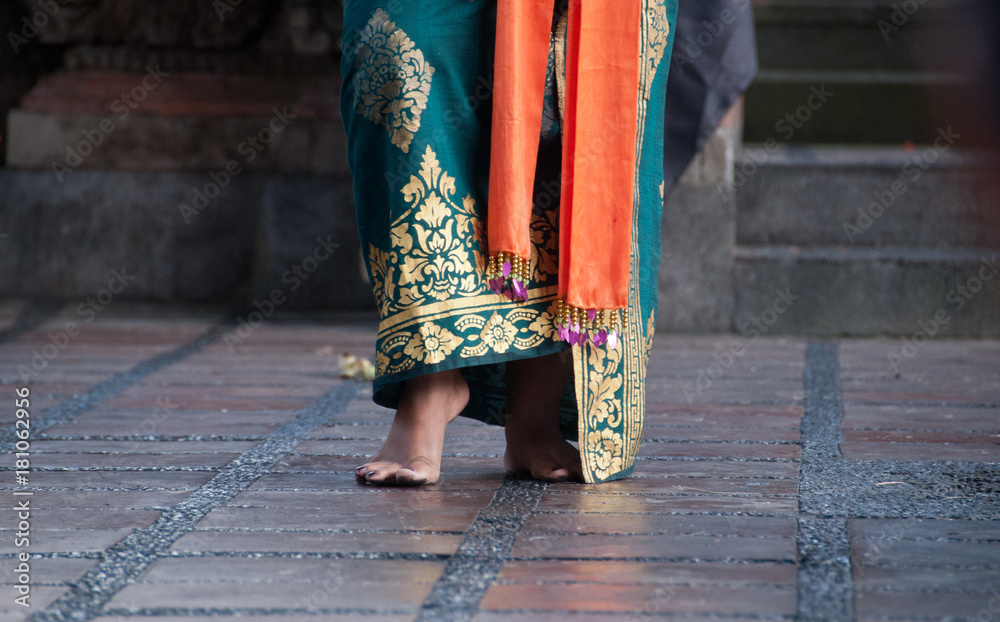 Feet of traditional Bali dancer in Barong performance