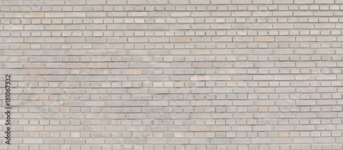 Beige brick wall panorama.