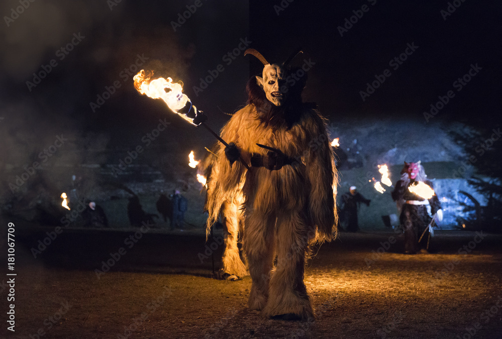 The Krampus come out of the wood during the traditional festival