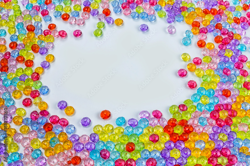 Background of colored beads on a white background
