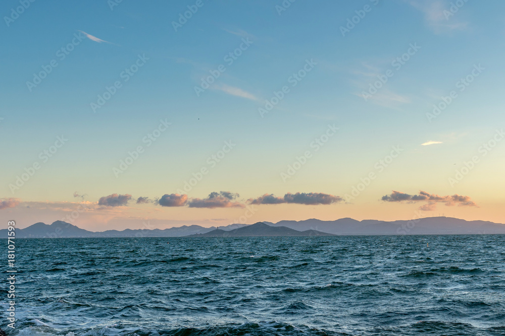 Sailing yacht and sunset in the sea. La Manga. Spain.

