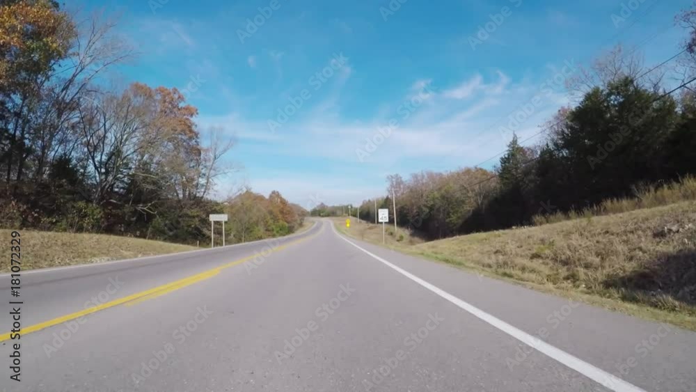 Branson MO,USA - November 10, 2017. POV. point view of autumn colors on a Branson road. Driving. Scenic view from car. Branson MO,USA - November 10, 2017. POV. point view of autumn colors on a Branson road. Driving. Scenic view from car.