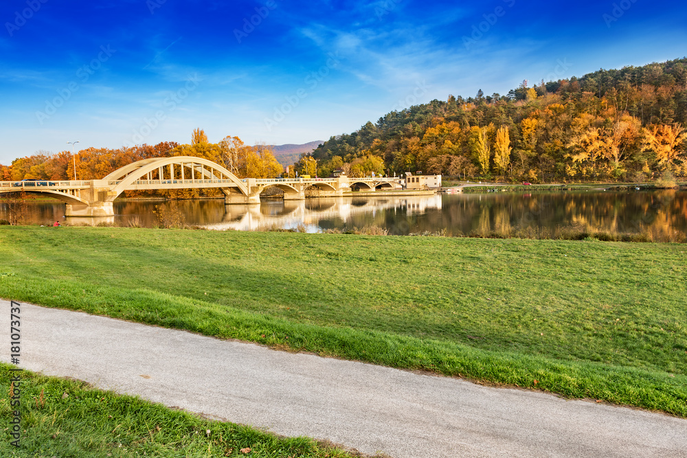 Bridge in Piestany (Slovakia), Vah river + blue sky + colorful autumn