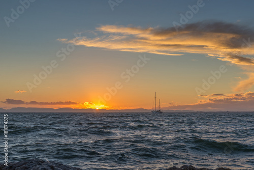 Sailing yacht and sunset in the sea. La Manga. Spain.     © kamira